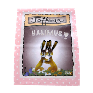 Kermatoffee vaaleanpunaisessa paperipussissa, jonka etiketissä kuvitus halaavista pupuista, sekä teksti "Halimus!"