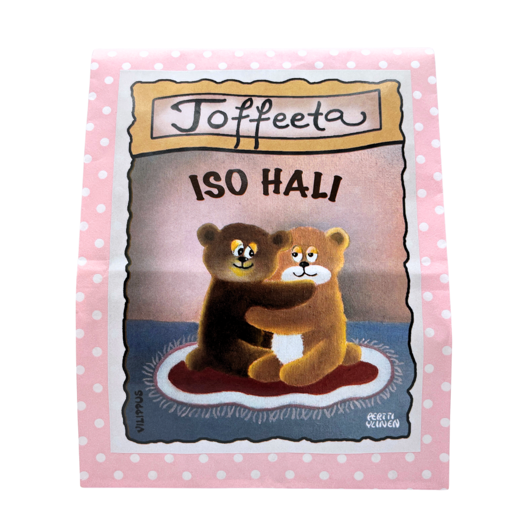 Kermatoffee vaaleanpunaisessa paperipussissa, jonka etiketissä kuvitus halaavista nalleista, sekä teksti "Iso hali".